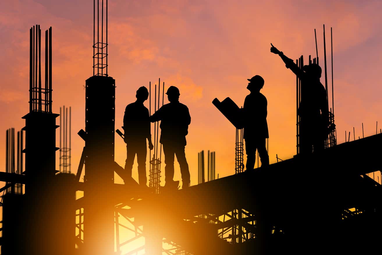 Silhouette of Engineer and worker on building site, construction